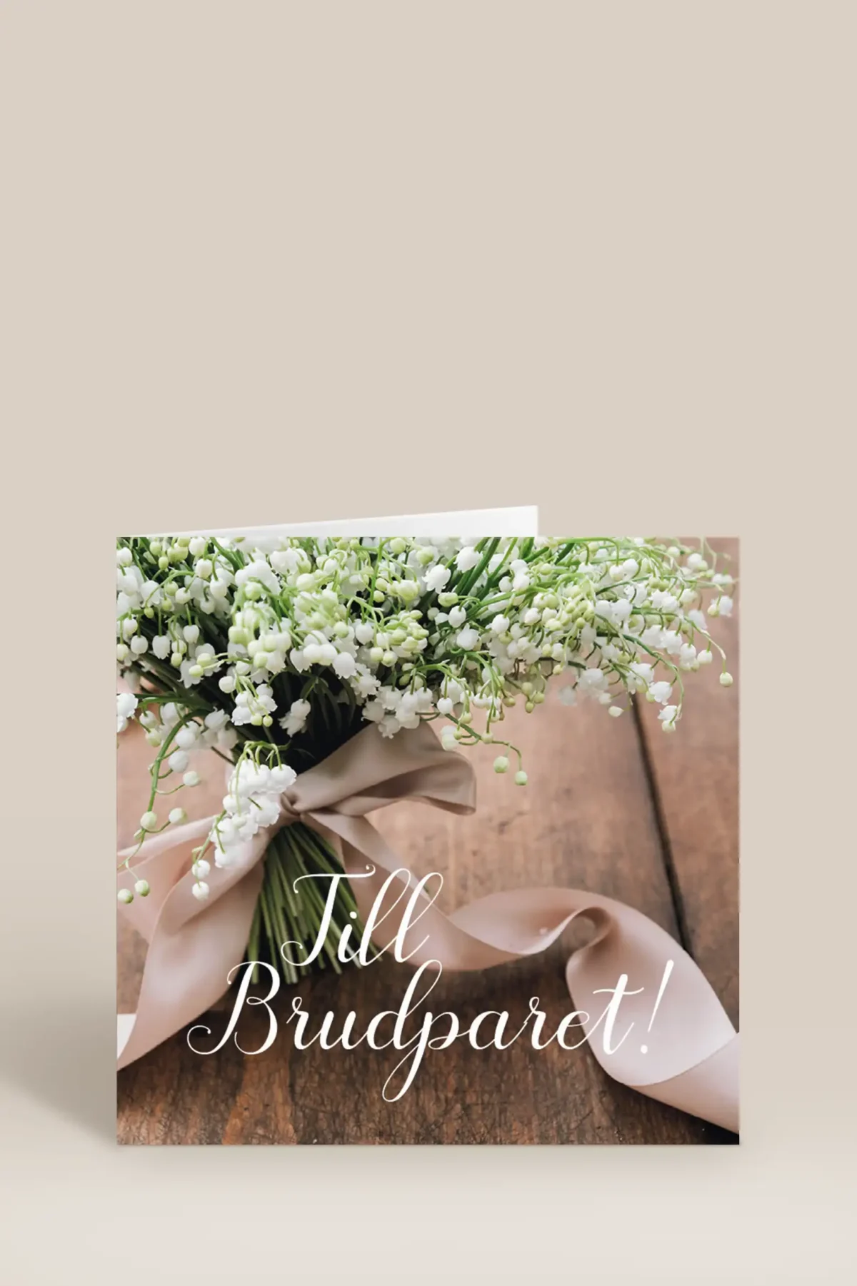 Till brudparet liljekonvaljer